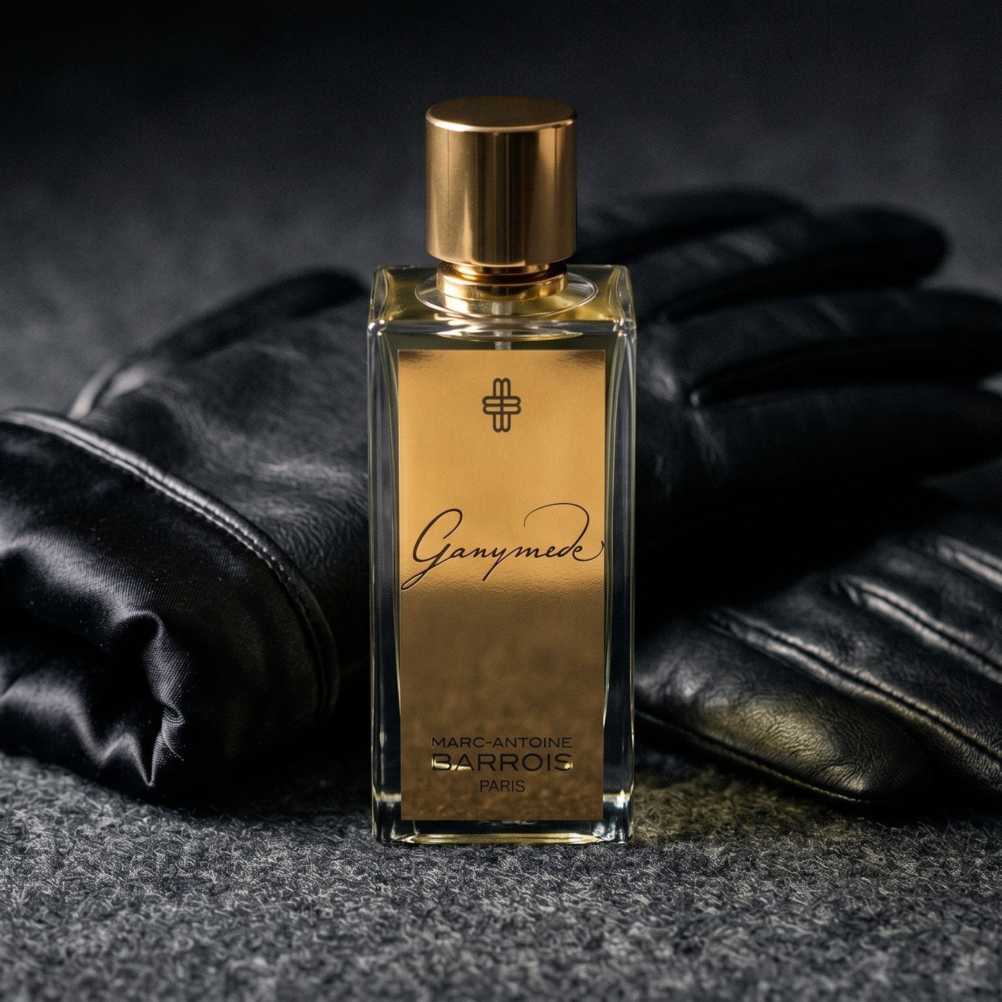Marc-Antoine Barrois Ganymede EDP on smoke-grey wool with a folded pair of driving gloves to the side