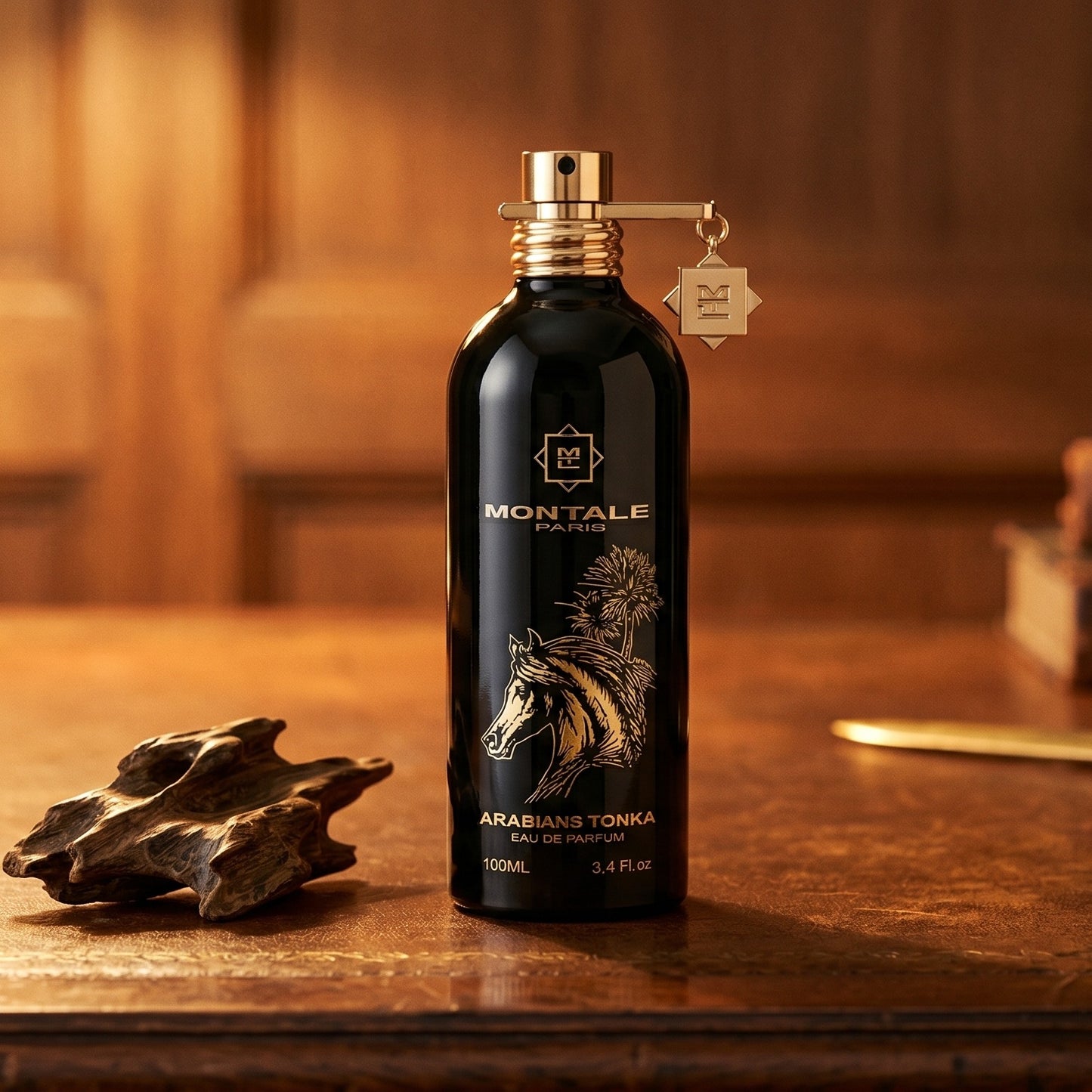 Montale Arabians Tonka on worn saddle-leather surface with oud resin chunks in a small dish