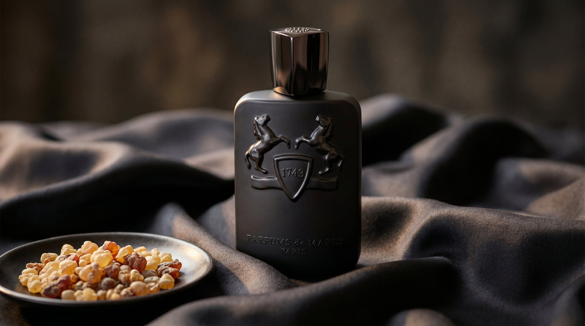 Parfums de Marly Herod on charcoal silk with frankincense resin granules in a small saucer