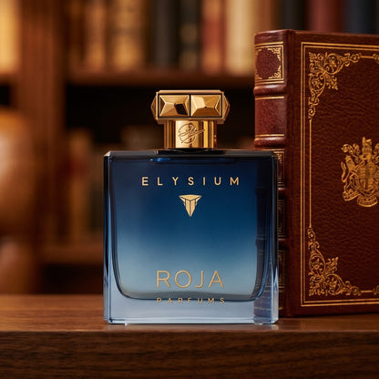 Roja Elysium Parfum Cologne on dark walnut library shelf with a leather-bound book trimmed in gold foil