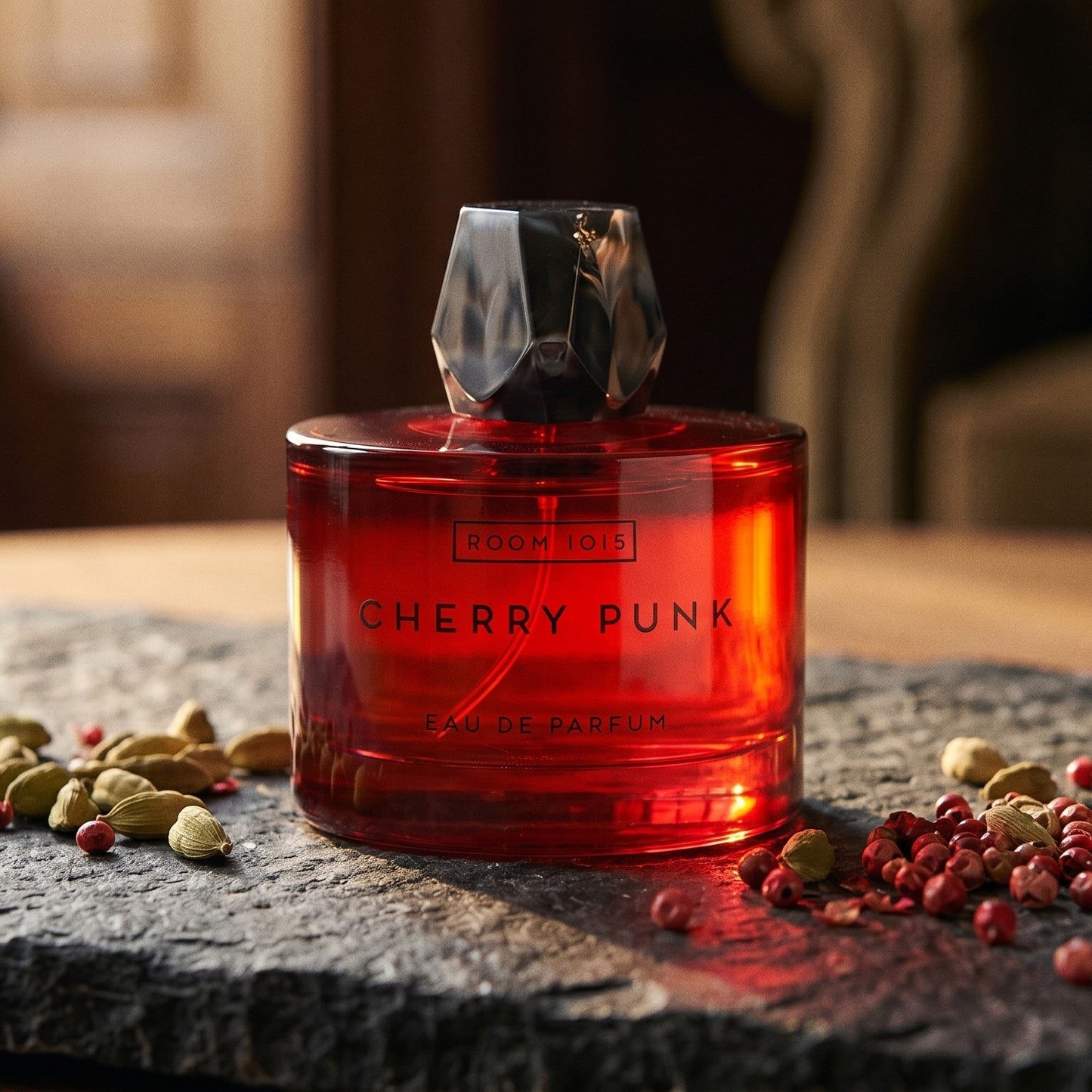 Room 1015 Cherry Punk EDP on blackened stone with a small copper tin of cumin and coriander