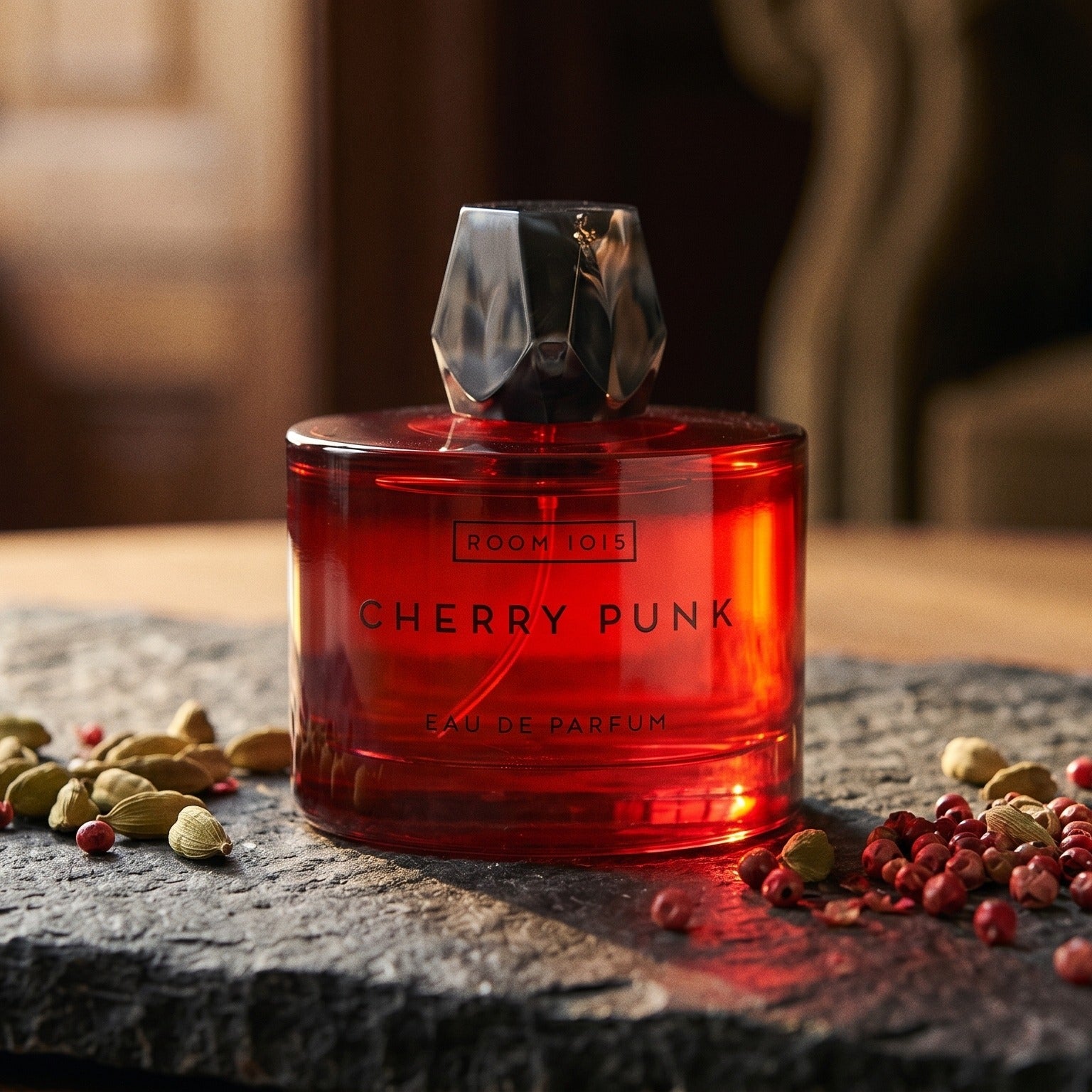 Room 1015 Cherry Punk EDP on blackened stone with a small copper tin of cumin and coriander