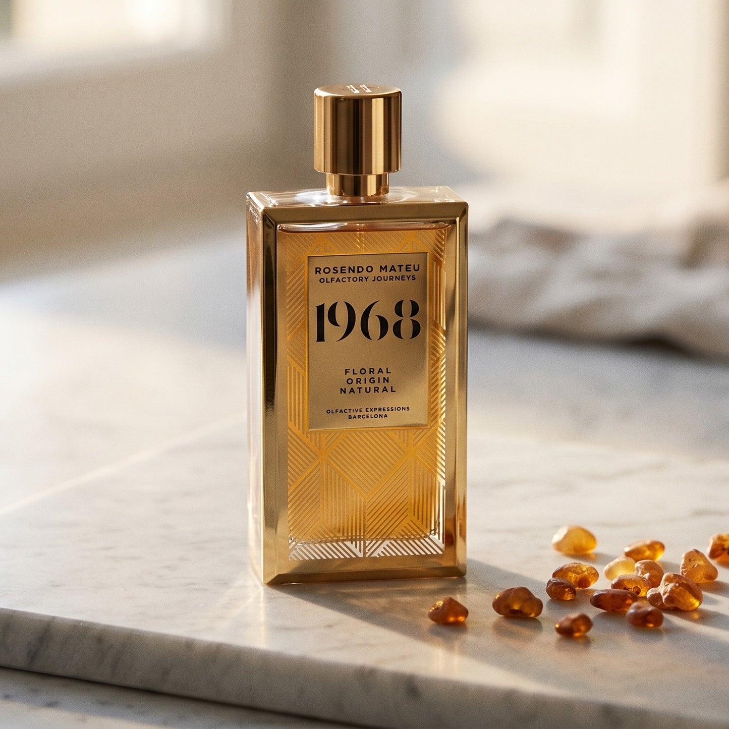 Rosendo Mateu 1968 EDP on pale grey marble with amber resin beads scattered to one side