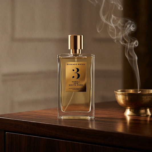 Rosendo Mateu No. 3 EDP on dark walnut console with a small brass incense bowl, smoke curling upward