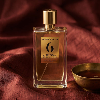 Rosendo Mateu No. 6 EDP on cinnamon-tone silk with a shallow saucer of warm benzoin resin