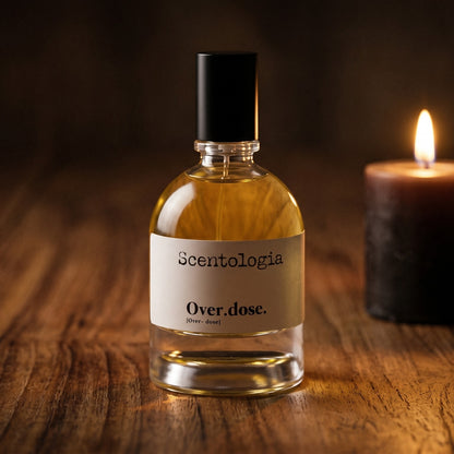Scentologia Overdose EDP on aged teak with a candle burning gently to frame-right