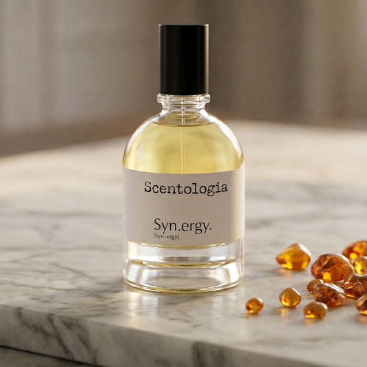 Scentologia Synergy EDP on polished limestone with benzoin resin pebbles arranged loosely