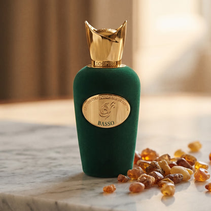 Sospiro Basso EDP on warm ivory travertine with labdanum chunks clustered by the base