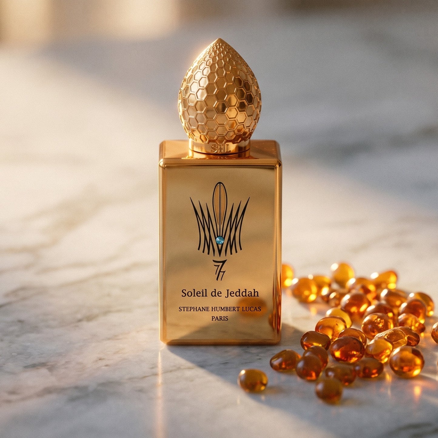 Stephane Humbert Lucas 777 Soleil de Jeddah Mango Kiss on polished limestone with benzoin resin pebbles arranged loosely
