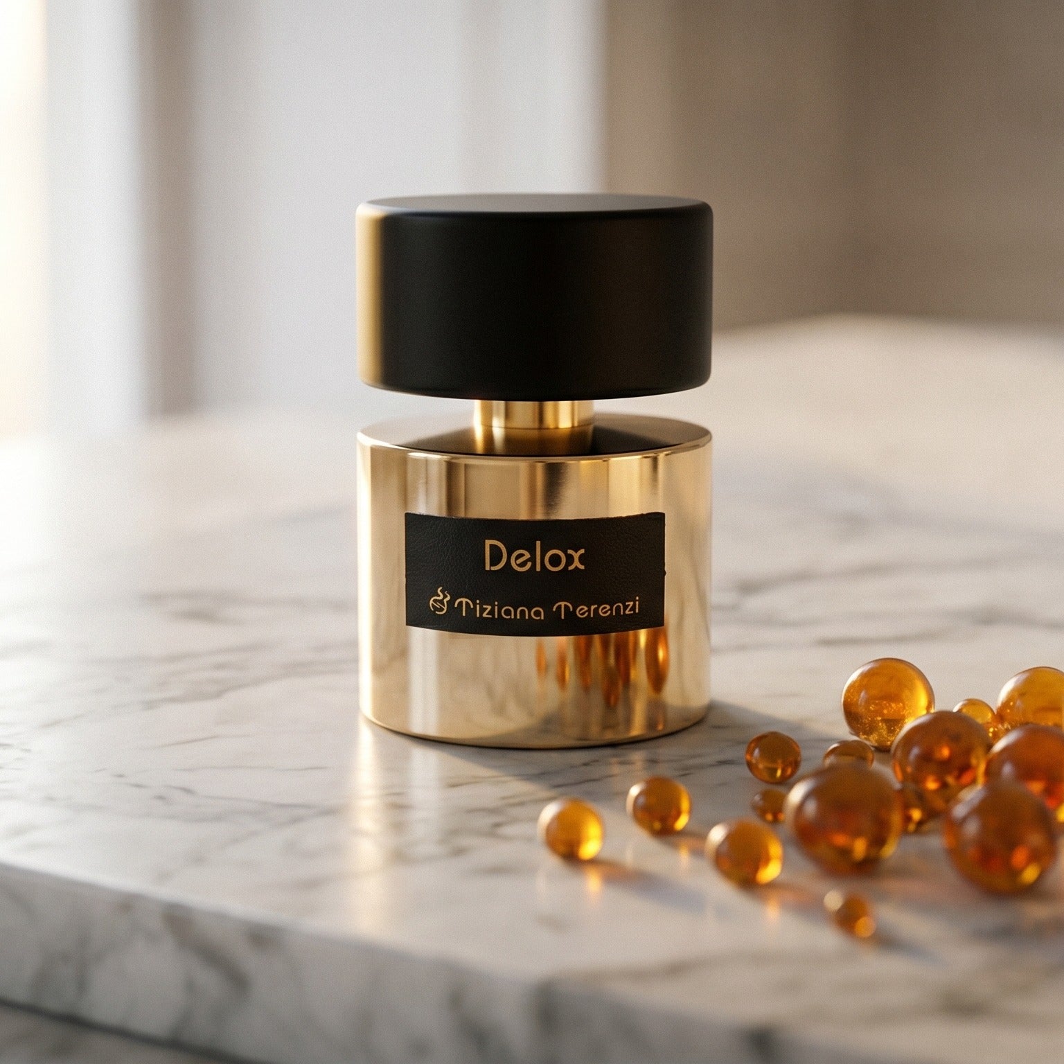 Tiziana Terenzi Delox EDP on pale sandstone with golden amber shards catching the light