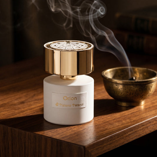 Tiziana Terenzi Orion EDP on charcoal slate with a slender oud chip and drifting incense smoke