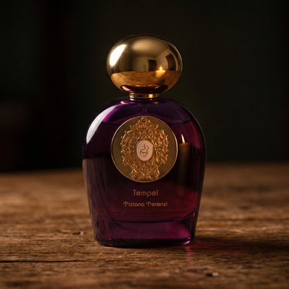 Tiziana Terenzi Tempel Comete EDP on aged maple with a slender candlestick and drifting smoke