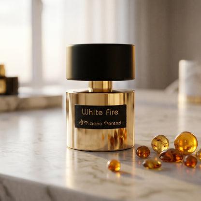 Tiziana Terenzi White Fire on warm ivory travertine with labdanum chunks clustered by the base