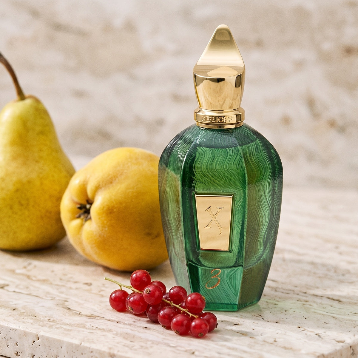 Xerjoff 3 Three Green Eau de Parfum - UAE Exclusive Dubai Boutique Edition on pale travertine with pear, quince and redcurrants