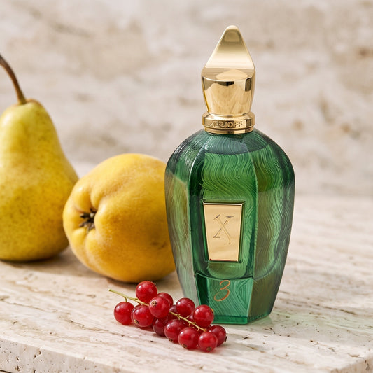 Xerjoff 3 Three Green Eau de Parfum - UAE Exclusive Dubai Boutique Edition on pale travertine with pear, quince and redcurrants