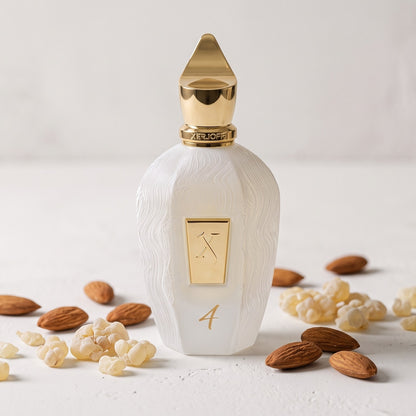 Xerjoff 4 Four White Eau de Parfum - UAE Exclusive Dubai Boutique Edition on smooth white plaster with almonds and olibanum tears